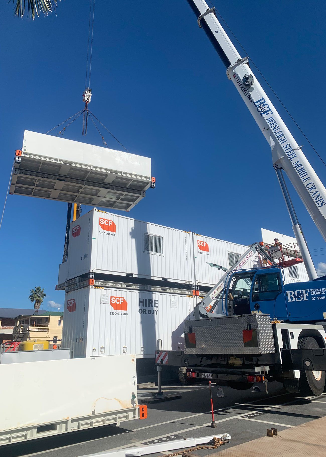 The overhead platforms and storage being installed.