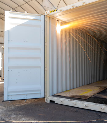 Cutting a container in preparation for roller doors