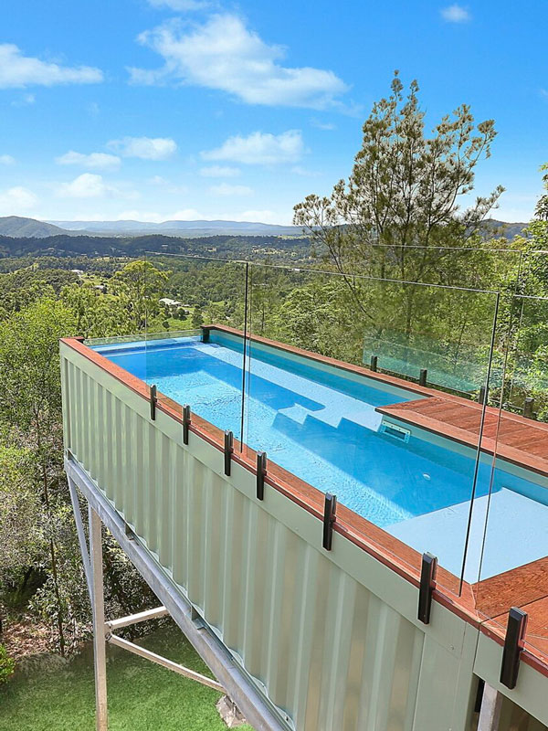 An elevated container pool above the trees