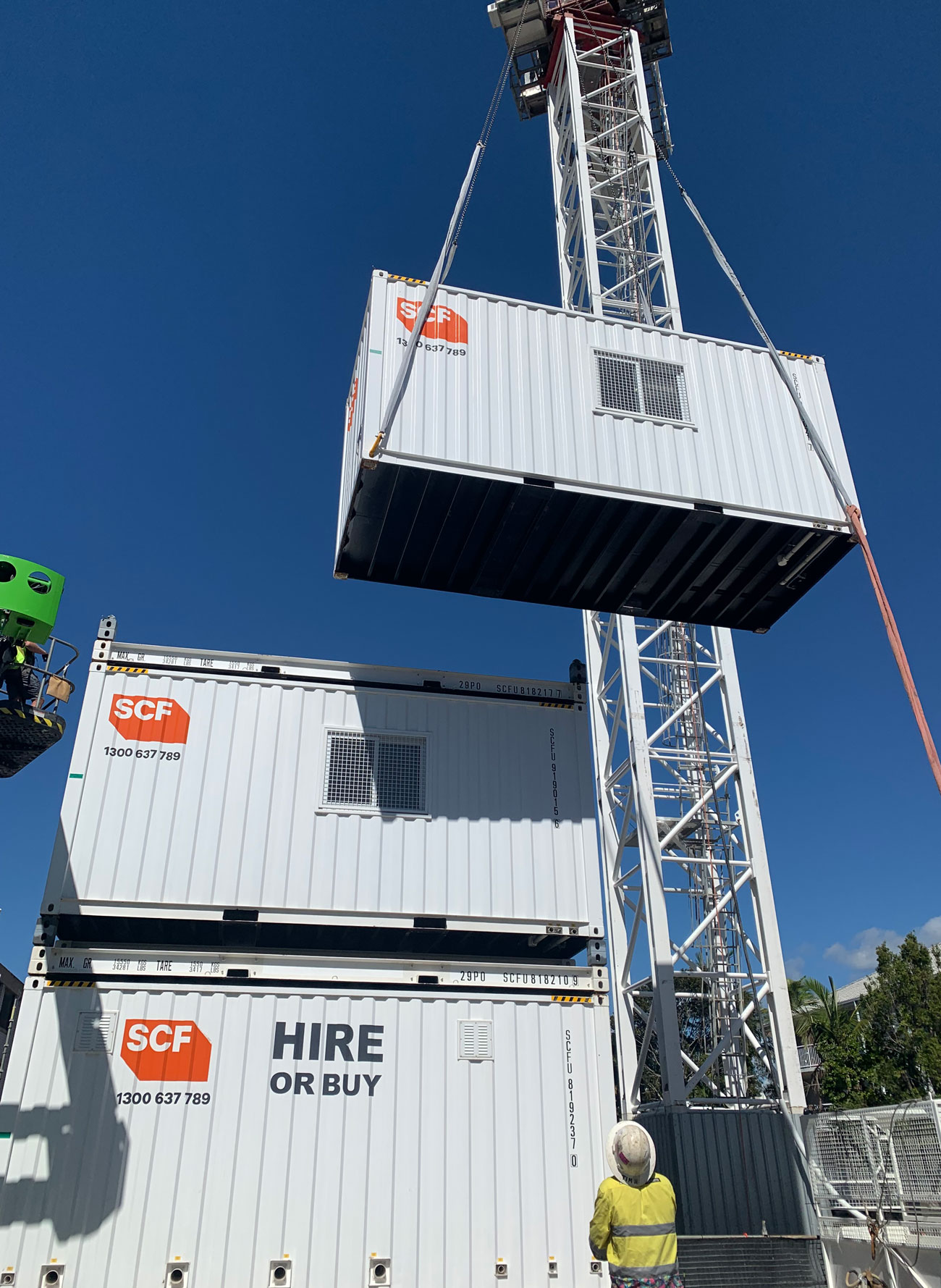 Stage 1 Install - The third level Site Shed is moved into place. This triple stack was required due to space limitations on site.
