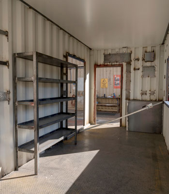 Shelving inside a container shed