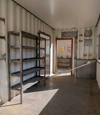 Shelving inside a container shed